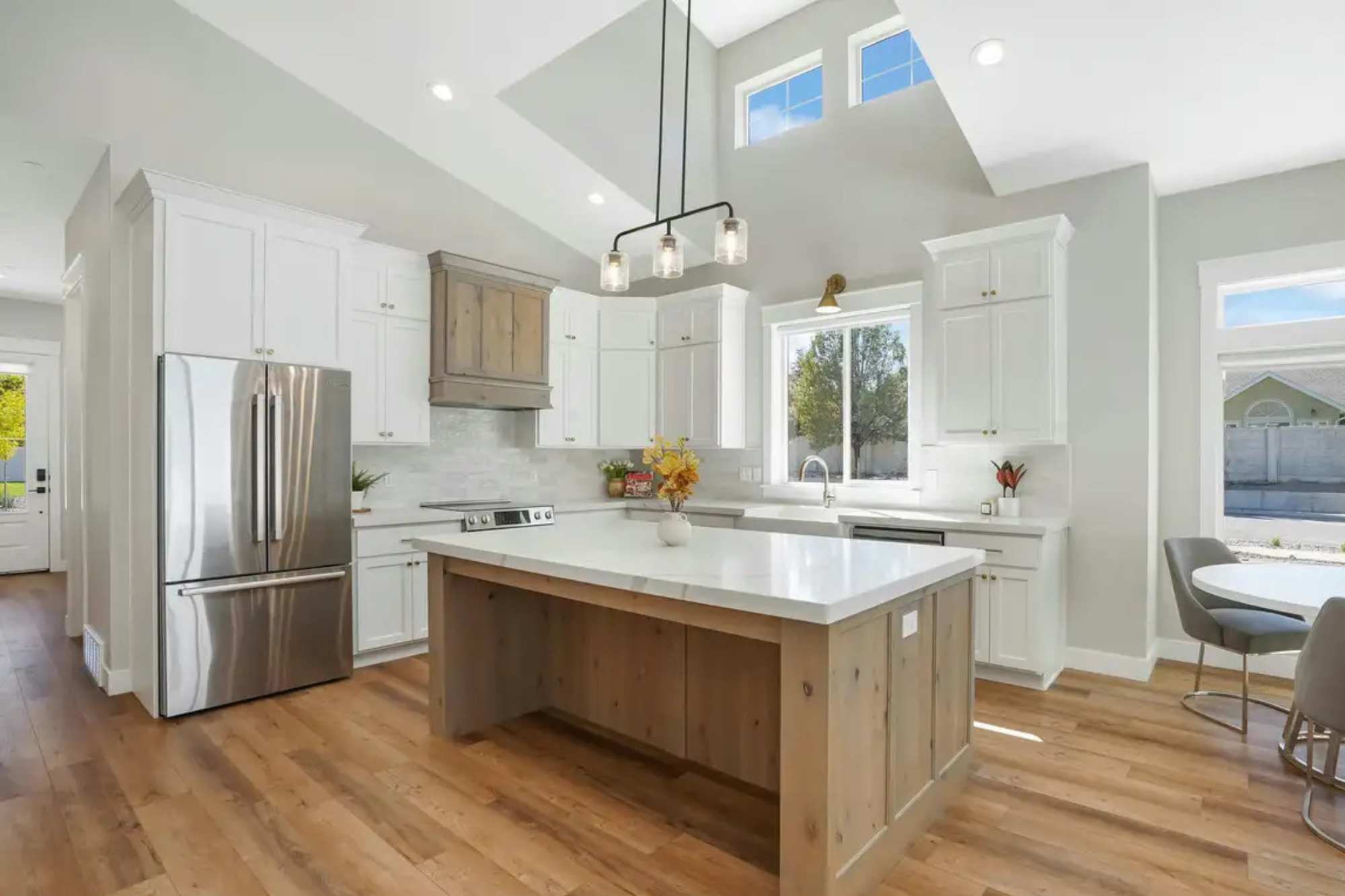 View of the custom kitchen inside of the Pura Vita 55+ Community in West Jordan, UT.